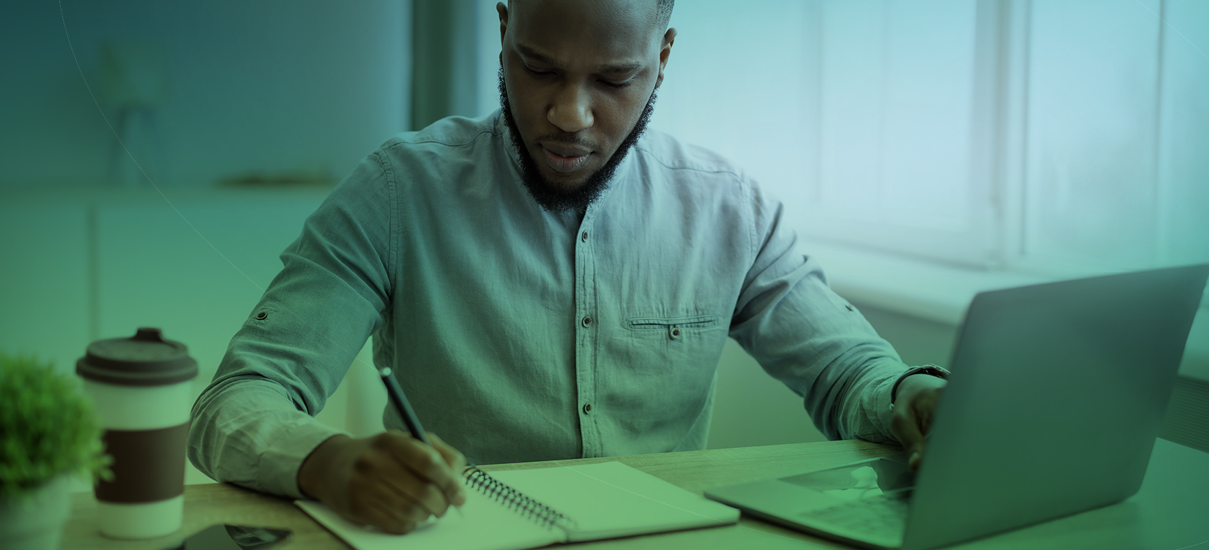 Man Working on Business Plan to Show the Importance of Good Business Plan in Raising Business Credit and Securing Small Business Funding