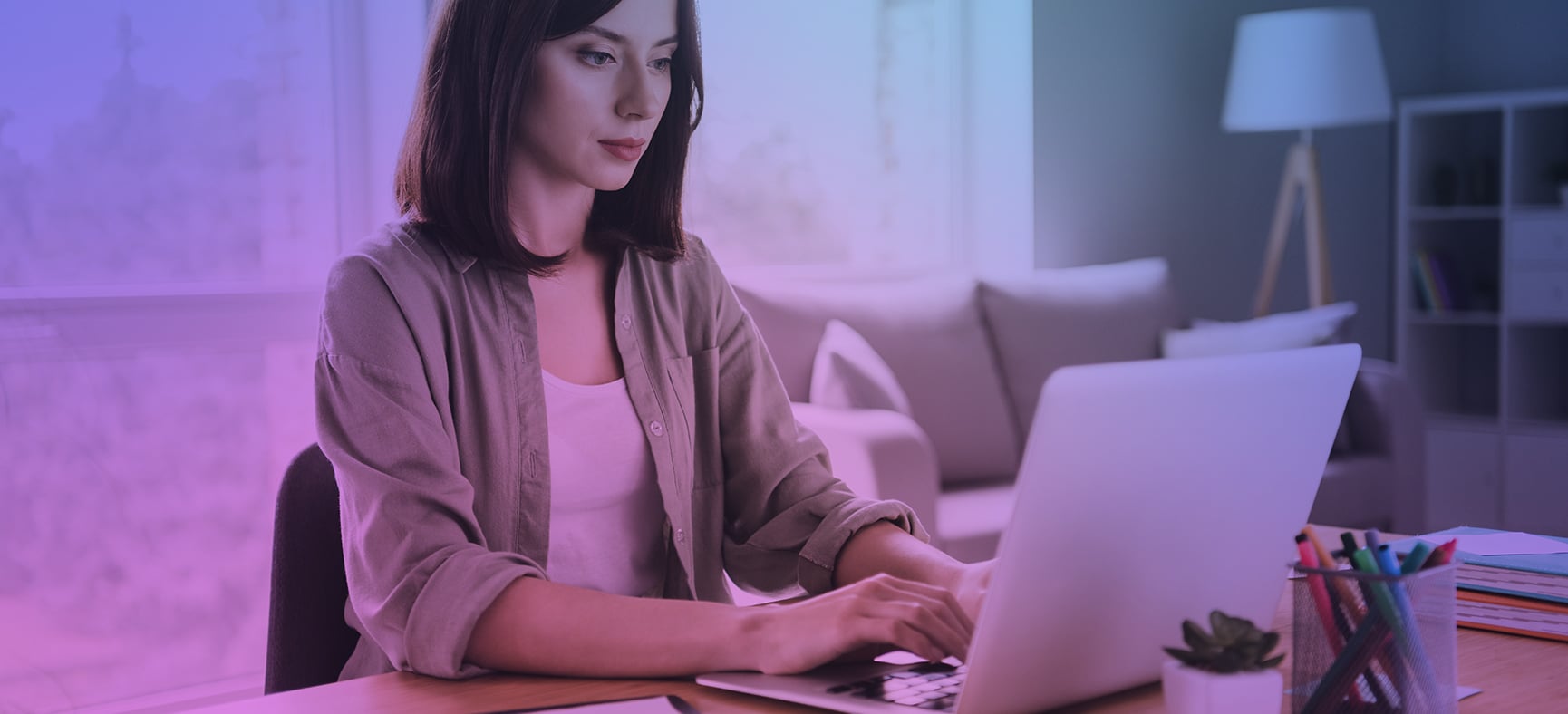 Woman types on laptop keyboard and avoids keyword stuffing