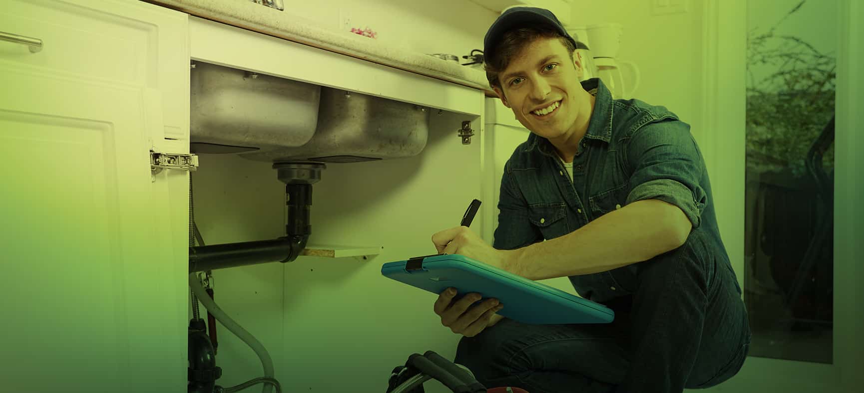 Plumber works under a sink and considers whether he needs to file a BOI report