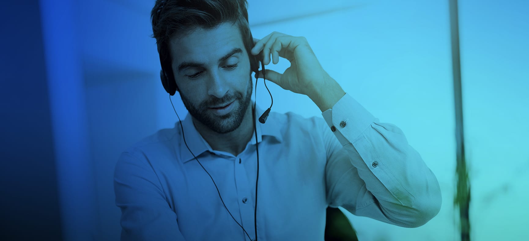 Customer Feedback Representative Talks on a Headset